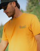 Expedition Club Graphic Tee - Spruce Yellow-Men's T-Shirt-Bad Birdie-with-Micah-Morris